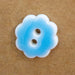 Bouton 2 trous - Fleur découpée - Taille 15mm Bouton Giannopoulos 09 