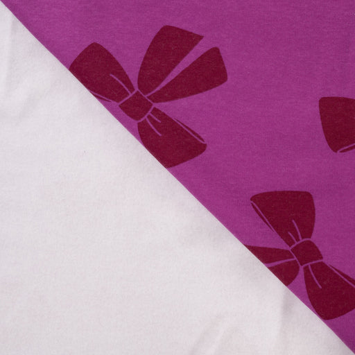 Jogging print bows fuchsia Tissus Quality Textiles 