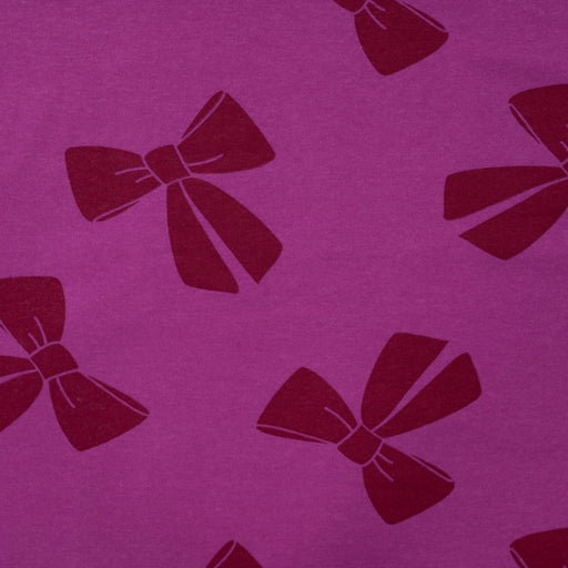 Jogging print bows fuchsia Tissus Quality Textiles 
