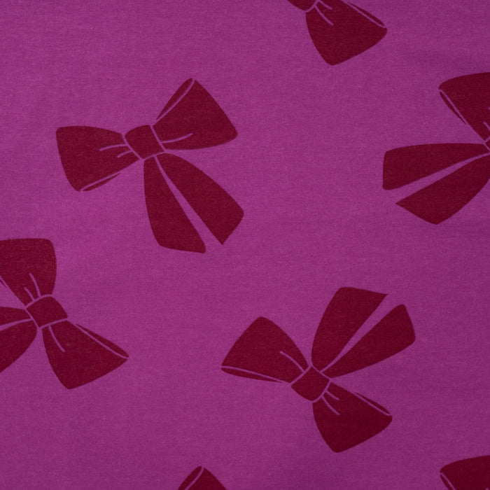 Jogging print bows fuchsia Tissus Quality Textiles 